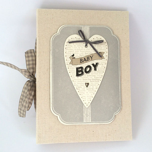 Celebrate and cherish those special baby moments. Gorgeous Baby Boy Heart Photo Album
