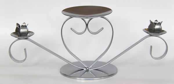 Charming heart shaped taper candle holder. Stylish, affordable candleholders made in UK.